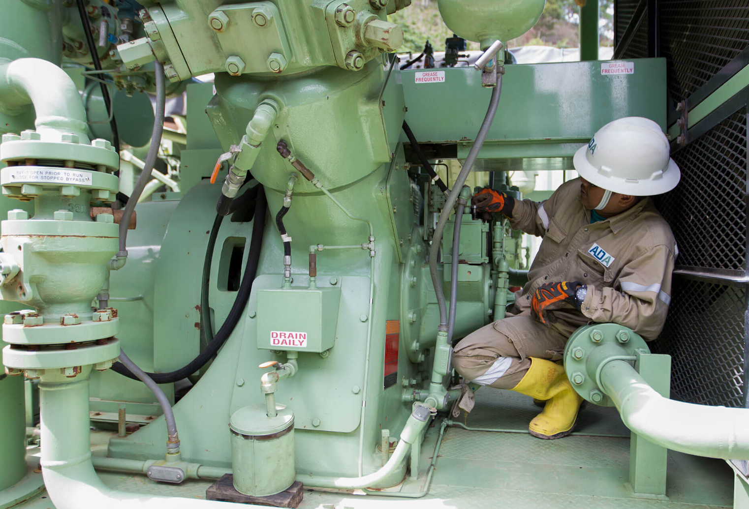 ADA worker inspects mechanical equipment